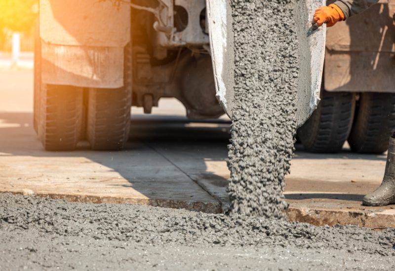 Pouring,Ready-mixed,Concrete,After,Placing,Steel,Reinforcement,To,Make,The Concrete installation and repair